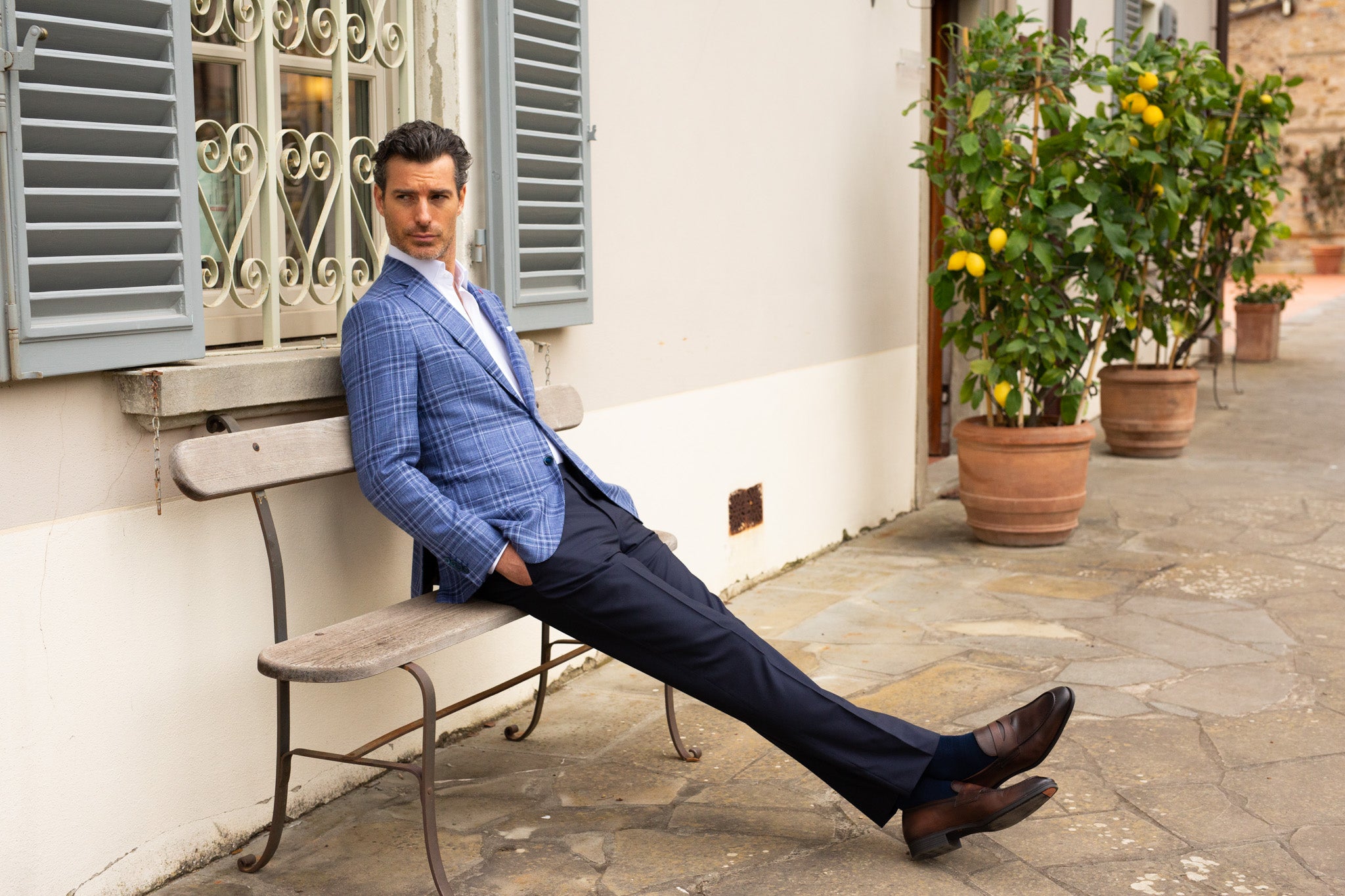 blue large print check jacket, white shirt, navy fromal trouser, navy socks and brown leather loafer