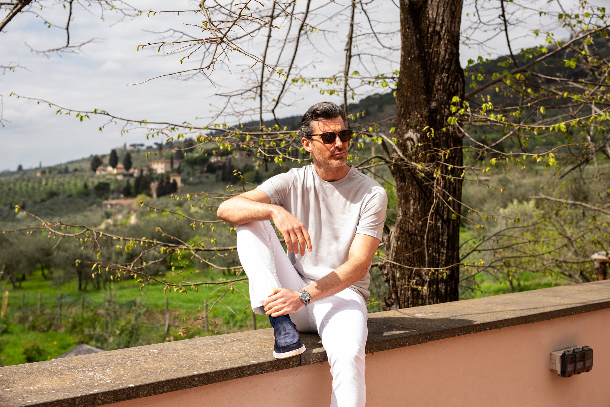 short sleeve light beige crew neck top, white jeans and navy suede loafer